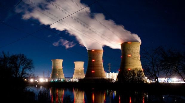 MIDDLETOWN, PA - MARCH 28: The Three Mile Island Nuclear Plant is seen in the early morning hours March 28, 2011 in Middletown, Pennsylvania. Demonstrators gathered at the 32nd annual vigil in remembrance of the disaster at the Three Mile Island Nuclear Plant, to remember the accident, in which Unit #1's core melted down on March 28, 1979. This year's vigil was dedicated to the victims of the earthquake and tsunami in Japan. (Photo Jeff Fusco/Getty Images/AFP (Photo by JEFF FUSCO / GETTY IMAGES NORTH AMERICA / Getty Images via AFP)