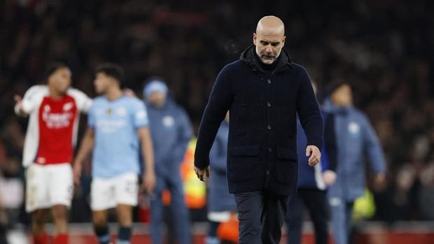 Soccer Football - Premier League - Arsenal v Manchester City - Emirates Stadium, London, Britain - February 2, 2025 Manchester City manager Pep Guardiola after the match Action Images via Reuters/Peter Cziborra EDITORIAL USE ONLY. NO USE WITH UNAUTHORIZED AUDIO, VIDEO, DATA, FIXTURE LISTS, CLUB/LEAGUE LOGOS OR 'LIVE' SERVICES. ONLINE IN-MATCH USE LIMITED TO 120 IMAGES, NO VIDEO EMULATION. NO USE IN BETTING, GAMES OR SINGLE CLUB/LEAGUE/PLAYER PUBLICATIONS. PLEASE CONTACT YOUR ACCOUNT REPRESENTATIVE FOR FURTHER DETAILS..